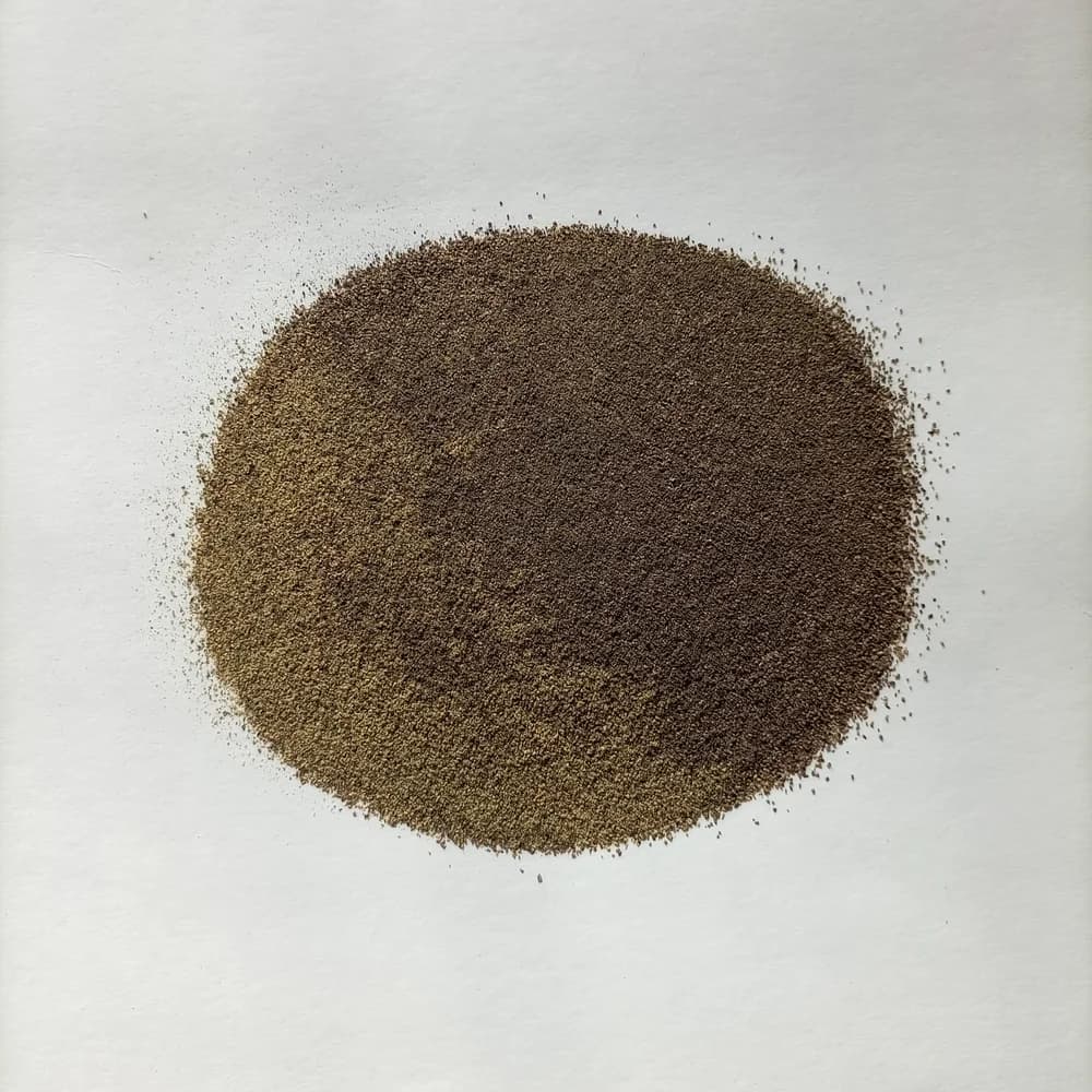 Freshly ground black pepper in a white dish